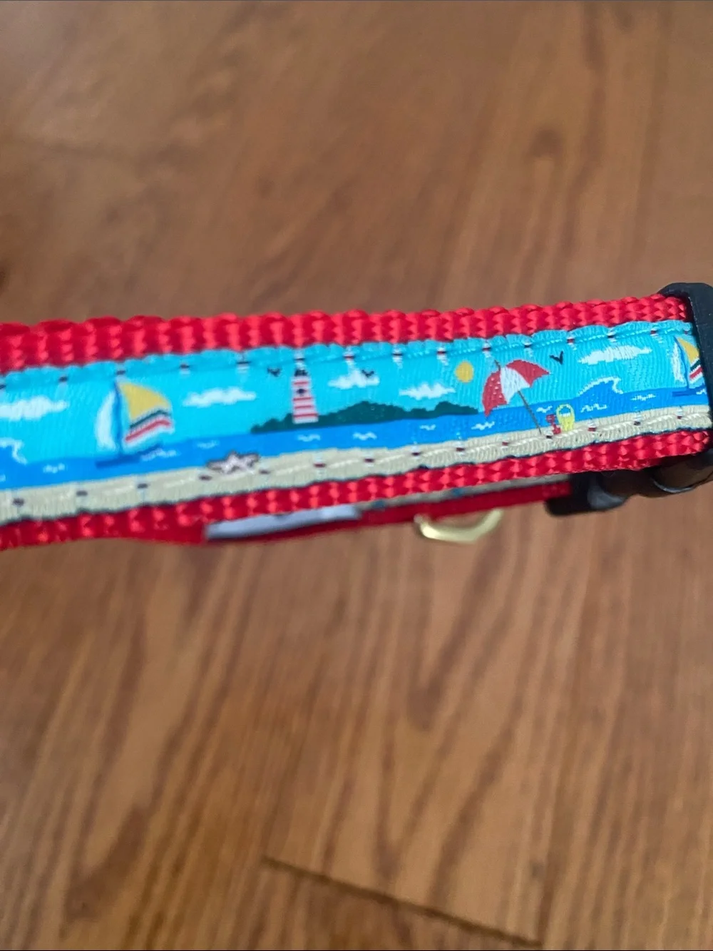 Red Patterned Dog Collar with Blue Sailboat Accent by Unknown